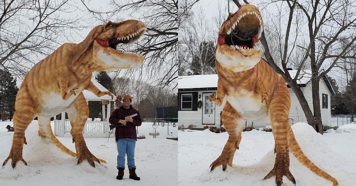  In his yard, a man managed to carve a 12-foot-tall T-Rex out of snow